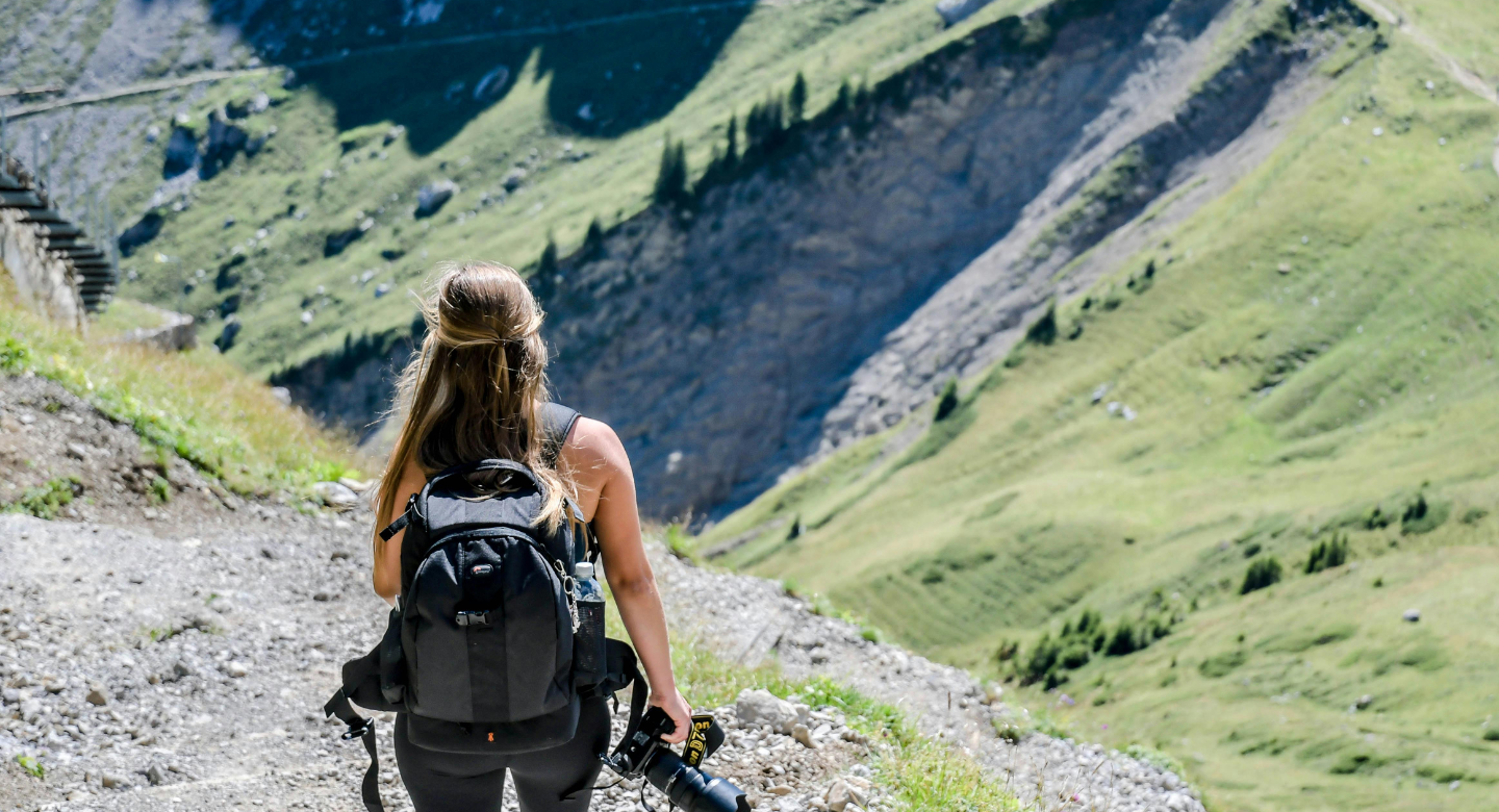 Photographer-trekker in-the-mountain